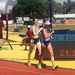 Girls 5.000 track walk: a group during the race