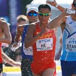 35km men - He Xianghong, Masatora Kawano and Massimo Stato at refreshment point