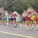 4th Station: men pack after the start (by Jean Pierre Dahm - FRA)